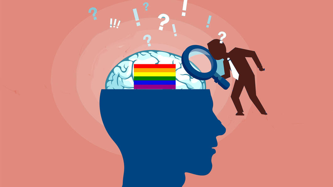 Tekening van iemand die met een loep naar een menselijk brein kijkt waarin een regenboogvlag zit
