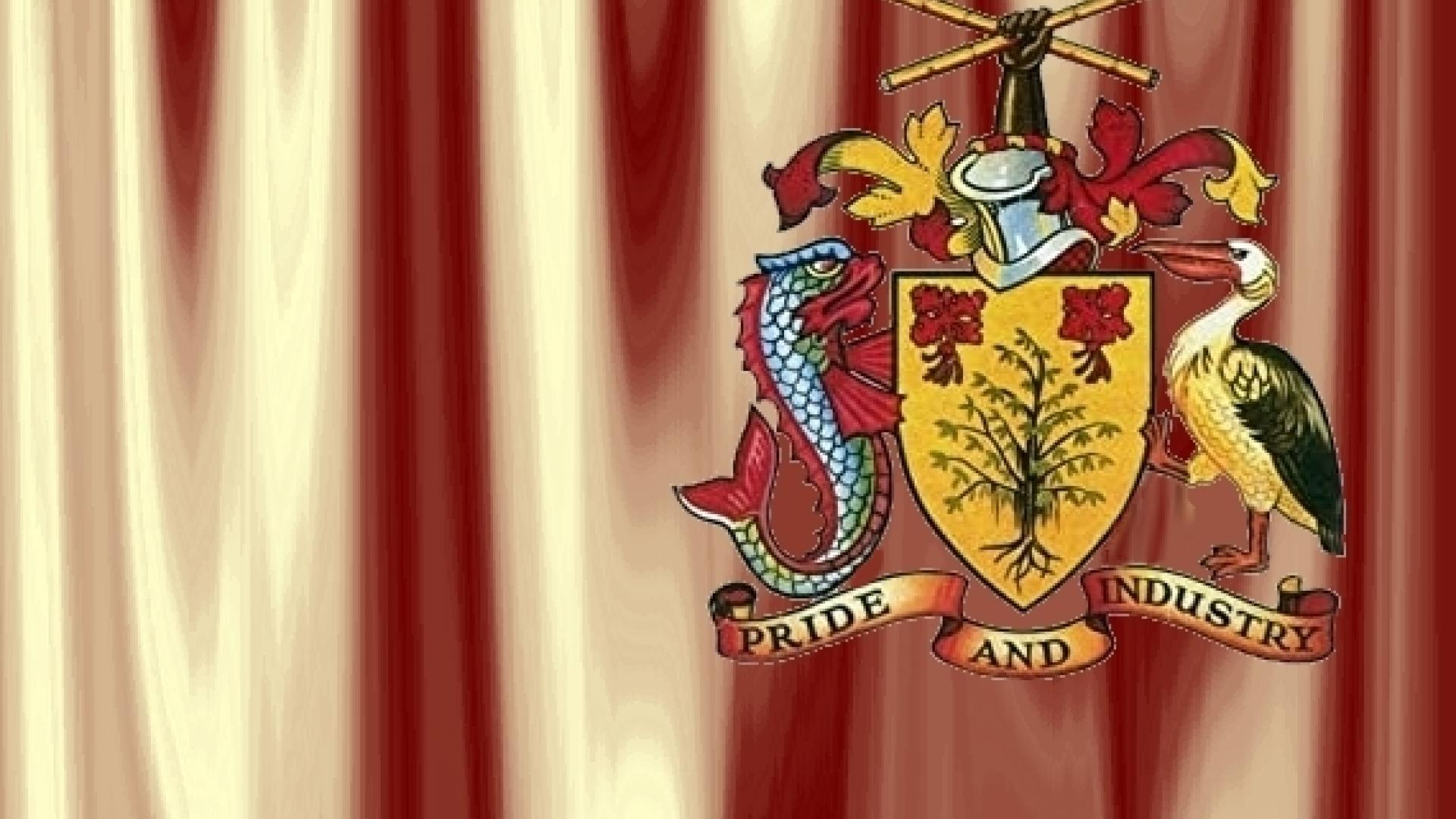 wapenschild van Barbados met daaronder het motto "Pride and Industry"