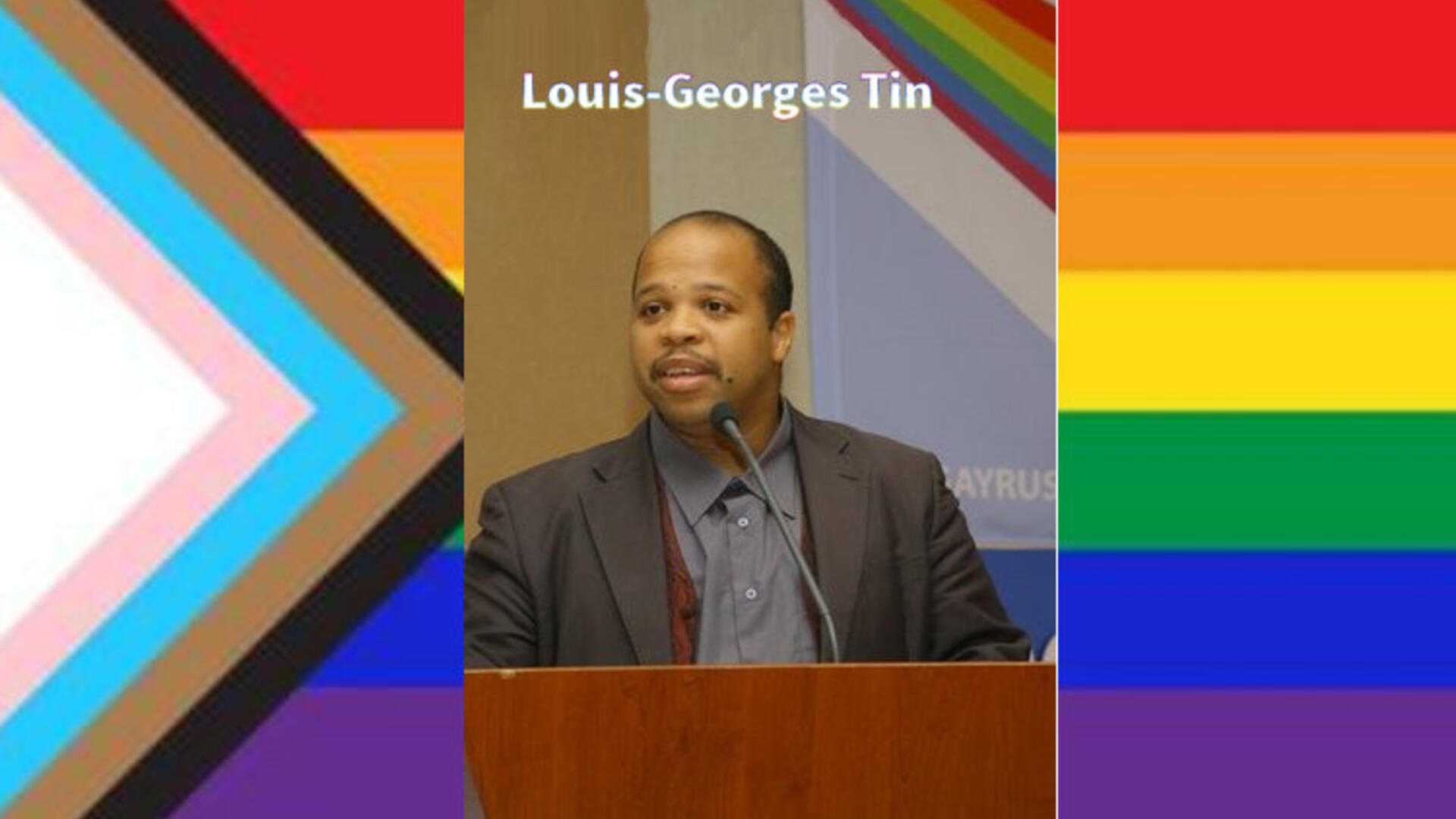Portret van Louis-Georges Tin in een progressiv e rainbow flag